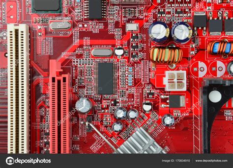 Red computer motherboard Stock Photo by ©unkas 170834910