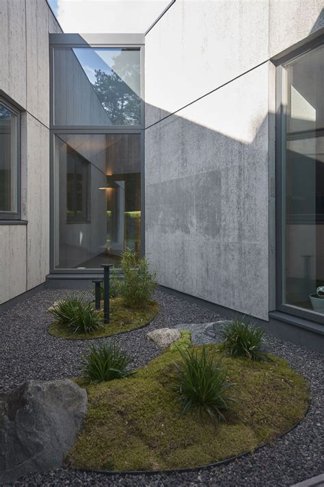 Residential Minimalist Concrete House At The Seaside