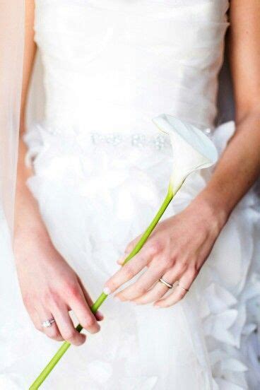 Great savings & free delivery / collection on many items. This Bride Carries A Single White Calla Lily×××× | Calla ...