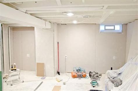 Basement Progress White Painted Ceilings And Drywall Is Up