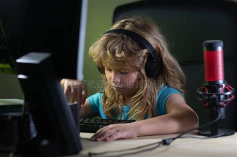 Little Child Gamer Play Computer Game On Desktop Gaming Stream And