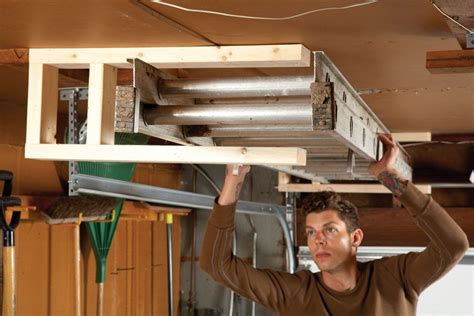 18 Organizing Ideas For Hard To Store Stuff Ladder Storage Garage
