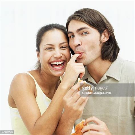 guy licking finger photos and premium high res pictures getty images