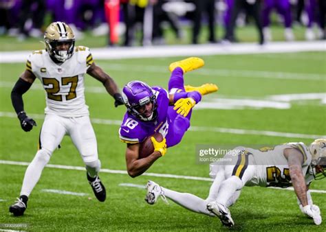 Minnesota Vikings Wide Receiver Justin Jefferson Is Tackled By New