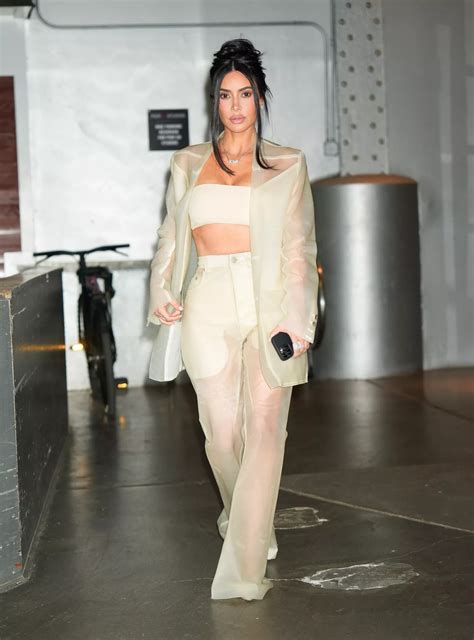 kim kardashian yassified business casual in a completely see through pantsuit kenh18h