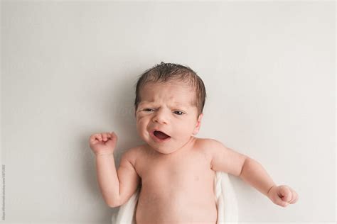 A Baby Making A Funny Face By Stocksy Contributor Alison Winterroth