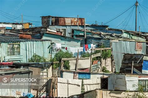 Shantytown Made Of Wood And Corrugated Iron Shacks With Electricity