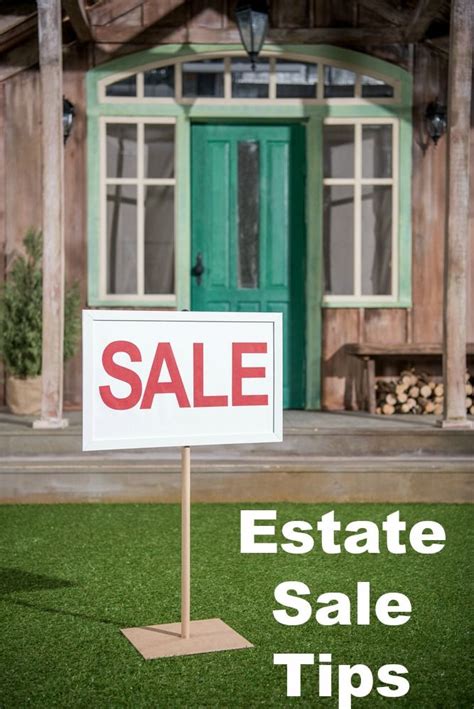 A Real Estate Sale Sign In Front Of A House