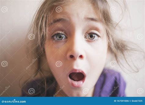 Little Girl Looks With Great Surprise Stock Photo Image Of Portrait