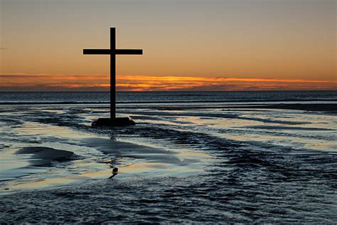 Royalty Free Cross On The Beach At Sunset Pictures Images And Stock
