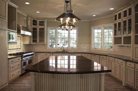 I've done gray cabinets in a kitchen before, i still love it, but for this remodel, i'm choosing a warmer n. Tan Kitchen Cabinets with Black Granite Countertops - Transitional - Kitchen