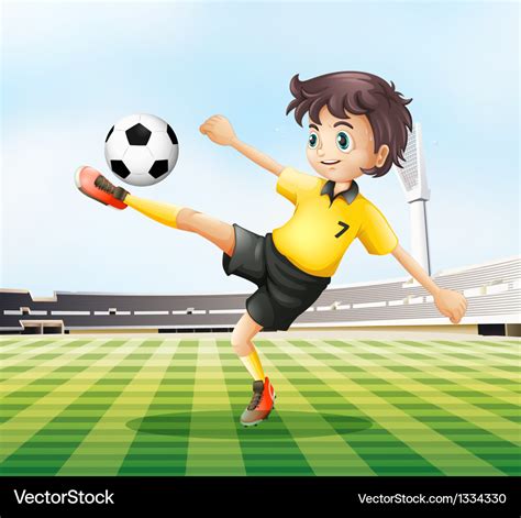 A Football Player Kicking The Ball Royalty Free Vector Image