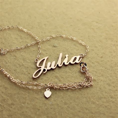 Stamping is left natural (not darkened) to give this piece a beautiful and elegant look. Solid Rose Gold Julia Style Name Necklace