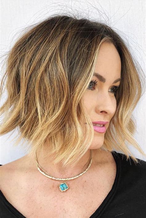 A hairstyle with a strong angular front and adding height will help to elongate the face, says rosenkranz. Long Angled Bob Haircuts That Prove Blunt Isn't Always ...