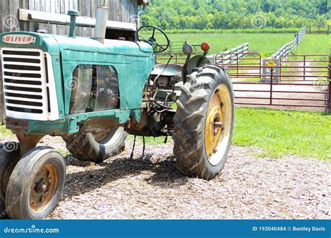 A Tractor Parked Next To A Barn Editorial Stock Image Image Of Parked