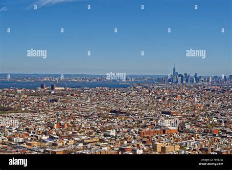 Aerial View Of Brooklyn With Downtown Manhattan In The Background On