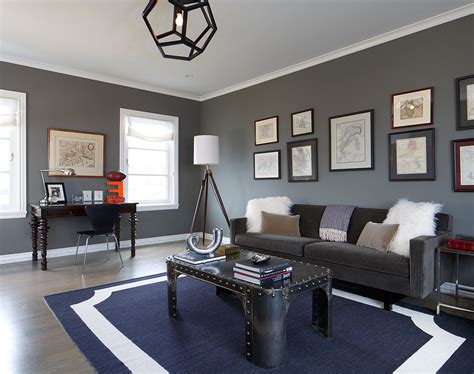 The living room is your home's centre. Charcoal Gray Sofa with Sheepskin Rugs Light Wood Floors ...