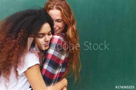 Afro American Woman Hugging Her Girlfriend Buy This Stock Photo And