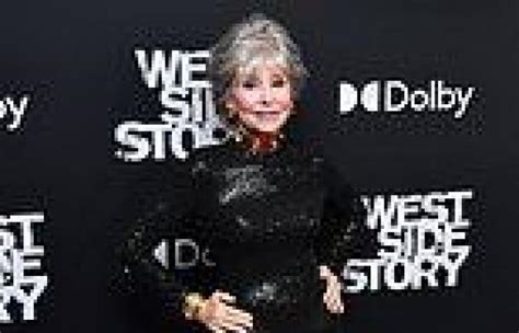 west side story star rita moreno 89 wears a shimmering black gown as she