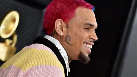 Chris Brown Shows Off Large Face Tattoo Access