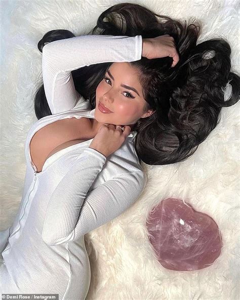 Demi Rose Puts On A Very Busty Display As She Slips Into A White