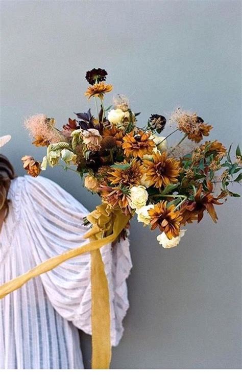 See the latest tips and ideas for your invitations, save the dates, escort cards, and dinner menus. Colors. Fall orange and mustard yellow | Flowers bouquet ...