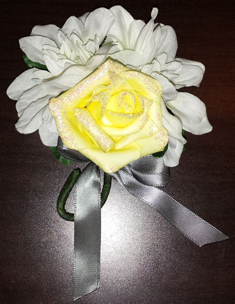 With fake flowers?insert silk flowers into the styrofoam, add ribbon around base and you've made a gorgeous bouquet. boutonniere for the groom. Bought fake flowers from ...