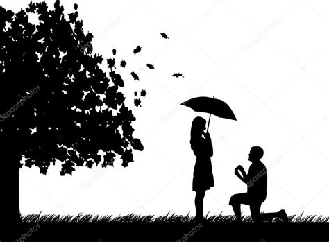 Romantic Proposal In Park Under The Tree Of A Man Proposing To A Woman