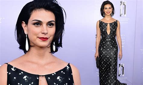 Morena Baccarin Flashes Cleavage In Stunning Form Fitting Black Dress