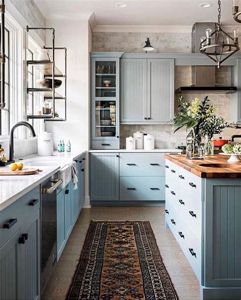 Blue painted kitchen cabinets decora cabinetry. inspiredlivingspaces: "thewelldressedhouse " light blue ...