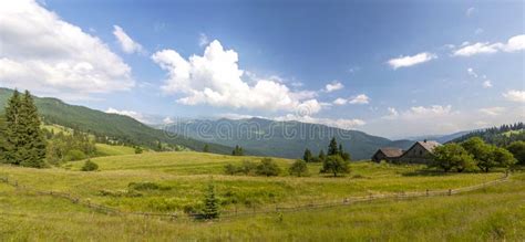 Village Houses On Hills With Green Meadows In Summer Day House Stock