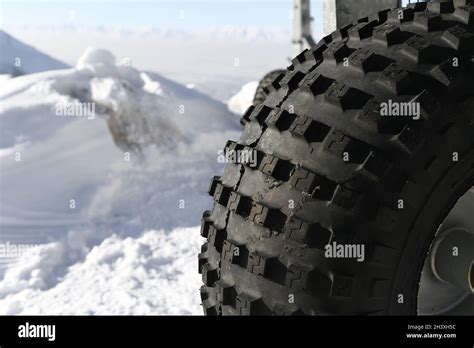 Snow Tire That Prevents Slipping On Snow And Ensures Safe Driving Stock