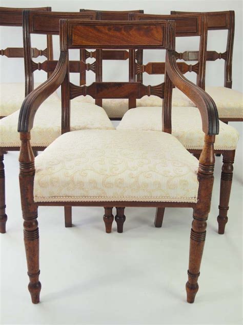 This is a beautiful antique regency style dining table with a set of 10 vintage matching chairs. Set 6 Antique Regency Mahogany Dining Chairs For Sale