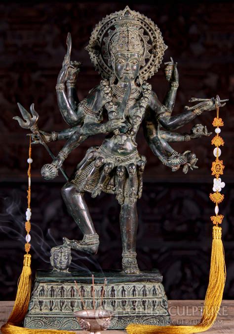 indonesian brass kali statue with skull necklace and 10 arms standing on head 23 119bb18b