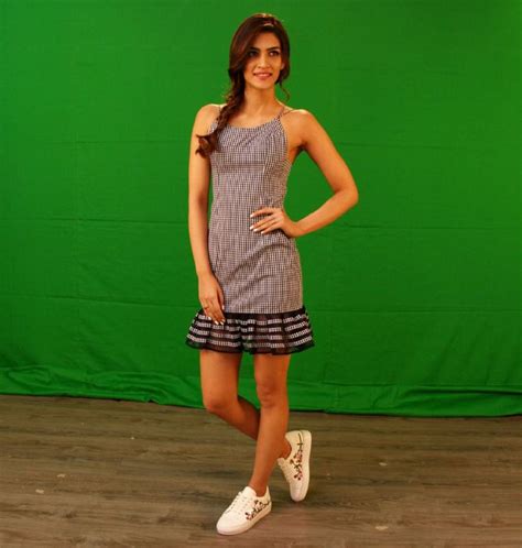 glamorous indian girl kriti sanon tight thighs legs in mini black skirt cinehub
