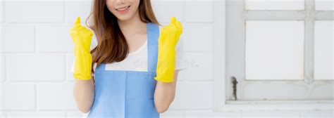 Portrait Young Asian Woman Is Housekeeper In Rubber Gloves And Apron
