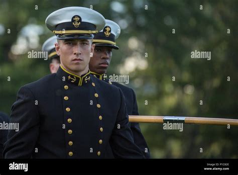 A Midshipman With The Us Naval Academy Usna Marches During The