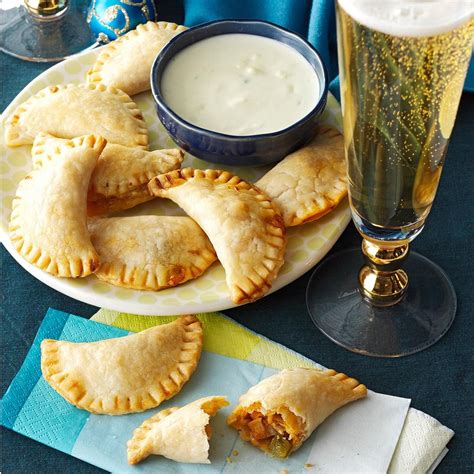 Top servings with blueberry sauce; Buffalo Chicken Empanadas with Blue Cheese Sauce Recipe ...
