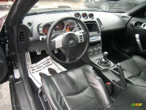 I don't know why nissan decided to poorly paint these little trim bits in. 2004 Nissan 350Z Touring Coupe interior Photo #44193259 ...