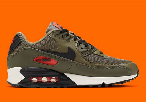 The nike air max 90 gets a sleek black and gold arrangement. Nike Air Max 90 Essential in Khaki Green and Orange ...