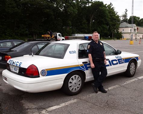 Mta Sergeant With Ford Interceptor Patrol Car Mta Police Department