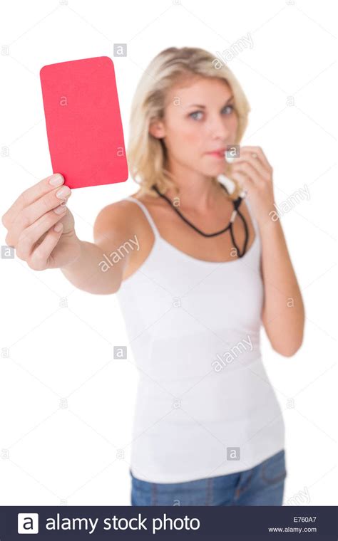 Young Woman Blowing Whistle And Holding Red Card Stock Photo Alamy