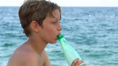 Young Boy Is Drinking Water Stock Footage Video 100