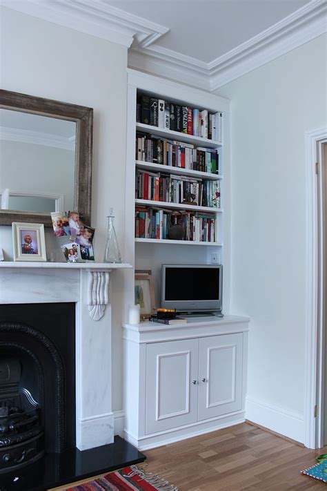Makes a great display shelf! built in bookshelves on either side of fireplace - Google ...