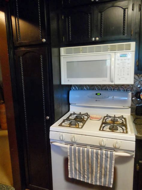 • most stoves have a drawer underneath them. Lip Gloss and Flats: Kitchen Ideas