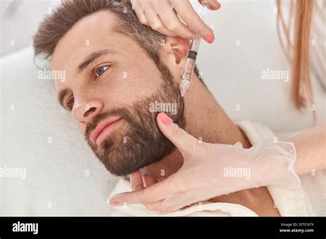 Close Up Makes Mesotherapy Injections To Beard Man Treatment Of Male