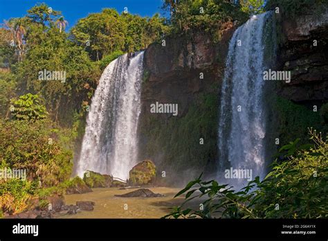 The Two Sisters Falls In The Tropics In Iguazu Falls National Park In