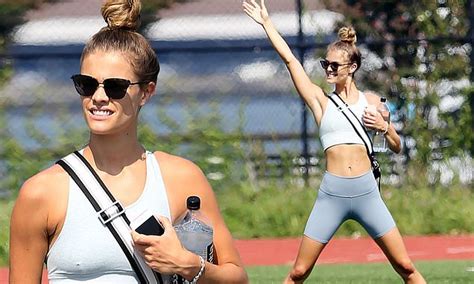 Nina Agdal Flaunts Her Model Figure In Bike Shorts And Crop Top During