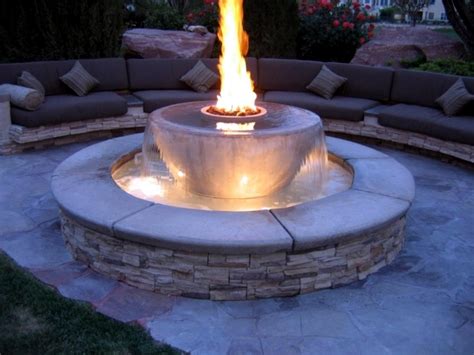 Sleek modern look in this stainless steel fountain. Garden stone fountain - 25 ideas for decorative fountains ...