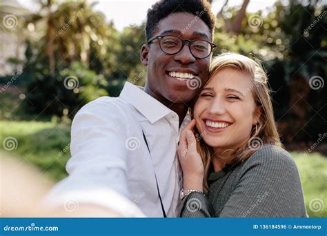 Beautiful Interracial Couple Making A Selfie Stock Photo Image Of